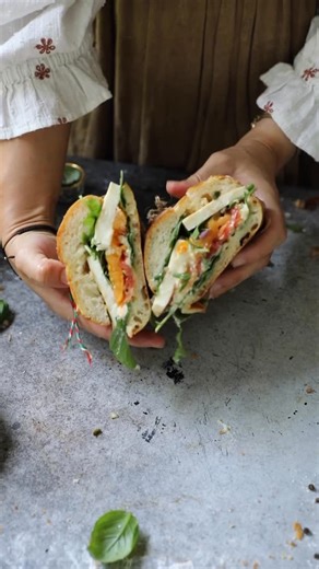 Betul Tunc on Instagram: "The next sandwich for our series is a classic with a twist: a simple Caprese Sandwich, but with a few special touches! It still has all the components—fresh tomato, creamy mozzarella, and fragrant basil—but my additions add even more flavor while still letting the original components shine. This has become a fast favorite of ours! Betül’s Caprese Sandwich Ingredients: 1 shallot, diced 1 tbsp capers 1 tbsp balsamic vinegar ¼ cup olive oil Salt and pepper to taste 2-3 hei