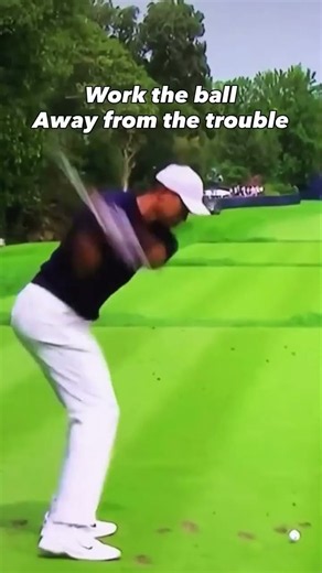 Tiger Woods- Start the ball towards the trouble with your swing and work it away from the trouble