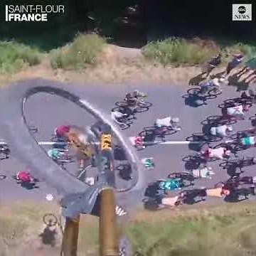 Daredevil mountain biker jumps over Tour de France | ABC News