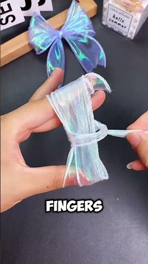 Learn how to make a beautiful ribbon knot with this simple tutorial!