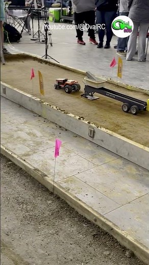 RC garden tractors are fast pulling that sled