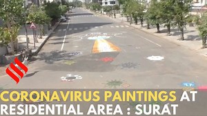 2.1K views · 18 reactions | Artists hailing from Surat’s Varachha area have made a painting on road to motivate and spread awareness among the society members. The painting showcases that coronavirus is entering in a society and wearing masks and gloves can stop it from entering in the society. The painting gives the message to stay at home, wear masks and gloves. | Indian Express | Facebook
