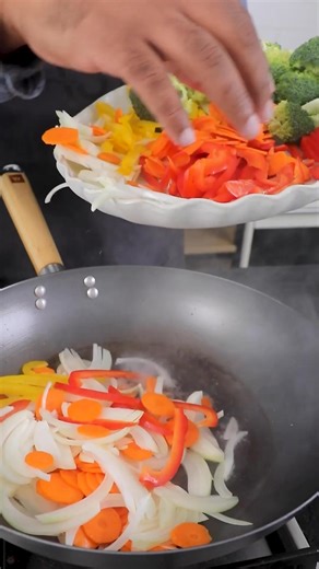 263K views · 2.6K reactions | The beef in this stir-fry has a tender,...