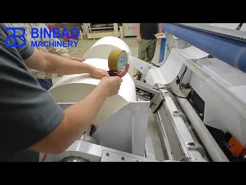 How to automatically unload the finished paper rolls from glassine release paper slitter machine？