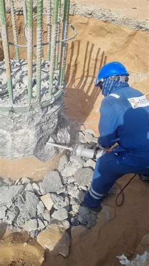 Breaking concrete with an electric jach hammer #construction #hardwork #heavylifti #crane #rigging