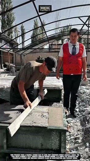 Leveling concrete with Work tool manual screed bar