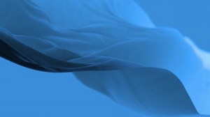 4k Blue wave satin fabric loop background.Wavy silk cloth fluttering in the wind.tenderness and airiness.3D digital animation of seamless flag waving ribbon streamer riband.