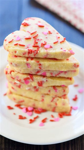 Heart-shaped cookies… no cookie cutter required!💕❤️ These EASY slice-and-bake shortbread cookies are perfect for Valentine’s Day baking or gifting. 💝 ✅ Comment RECIPE to have the link DMed straight to your inbox! (Just be sure you're following @fivehearthome or the message may not go through!) https://www.fivehearthome.com/easy-heart-shaped-shortbread-cookies-valentines-day-recipe/ (Or google "five heart home heart cookies”) valentine’s day | valentine’s day recipes | valentine’s day baking | 