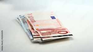 Counting various Euro banknotes - finance concept