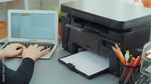 How to set up a multifunction printer with a laptop at home office for easy printing and scanning tasks
