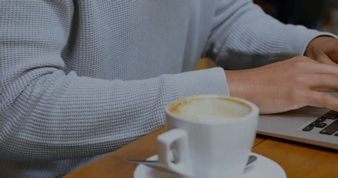 clip-3998218449-person-typing-keystrokes-causing-purple-numbers-float