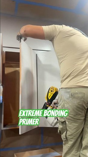 Spraying Extreme bonding primer from Sherwin-Williams #primer #cabinetpainting