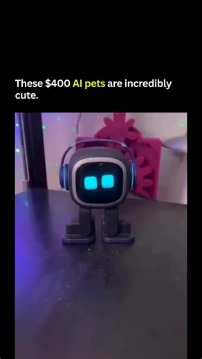 Essential AI Daily | Robots & Tech on Instagram: "These tiny robots are taking over the internet. They look incredibly cute. Most of these desktop companions like EMO or Loona rely on clever tricks. They use cameras for gesture recognition. You shoot a finger gun. They fall down. It feels like magic. But it is just a sensor reacting to a shape. Other bots like Eilik use vibration motors to feel a pet. It is not love. It is just hardware. Companies claim they use deep language models and learn yo