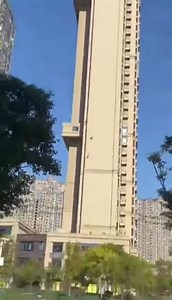 Woman Jumps Off In High Rise Building