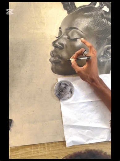 At the gallery, we recently completed a hyper realistic charcoal piece that pays homage to the indigenous African woman and the enduring language of her hair. This work centres on the Kiko hairstyle, a crown worn with quiet confidence and unmistakable pride. Every strand was rendered deliberately on chipboard paper, each shadow carefully layered, each highlight thoughtfully placed. Charcoal, in this piece, becomes more than a medium; it becomes a tool of preservation. The Kiko is not simply an a