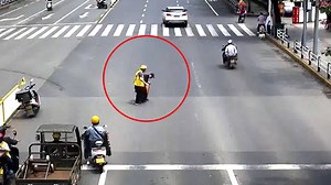 1.7M views · 10K reactions | An elderly man was struggling to cross the road after he missed the green light in Nanping City in east China on April 21, 2019. As vehicles stopped and waited for him to cross the road, a delivery boy parked his bike at the crossing and helped the man over. The good deed earned the biker a reprieve from a traffic cop who said he would not impose a fine for illegal parking. | CGTN | Facebook