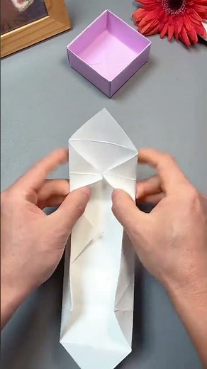 How to fold a square piece of paper into a good-looking and practical storage box without