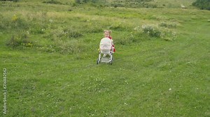 little girl with a stroller