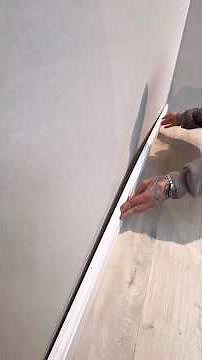 Quick and Easy Trick to Install Baseboards on Uneven Walls!#DIYHome #BaseboardInstallation