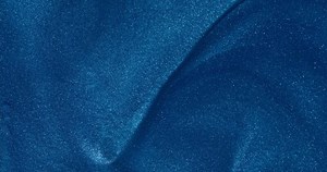 A blue liquid texture with a wave pattern