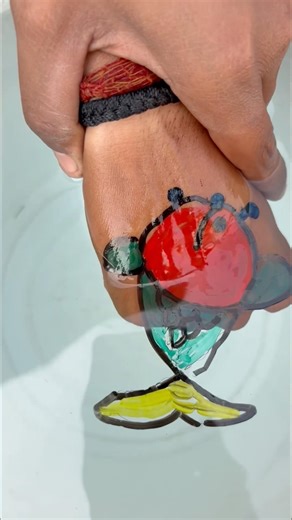 Fish drawing with water on hand #art