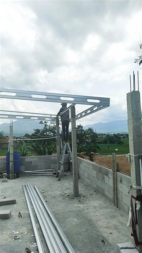 The process of installing a light steel frame made of hollow iron for a spandek canopy #work #bui...