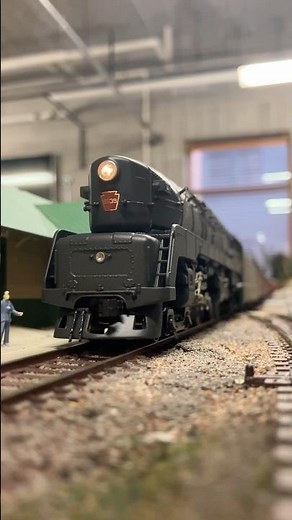 Ho scale Pennsylvania Railroad T1 Duplex leaving the station.