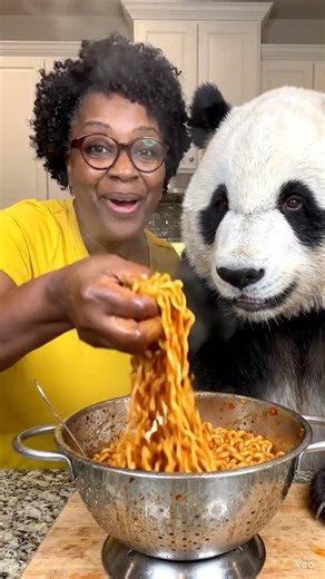 panda is in iting spicy noodles