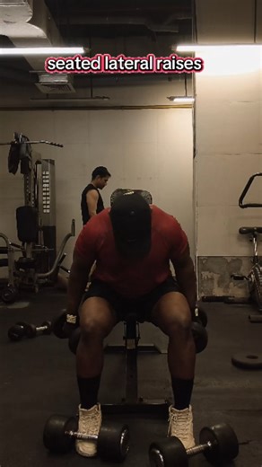 Shoulder lateral raises are an isolation exercise targeting the side (lateral) deltoids for wider shoulders, performed by lifting dumbbells out to the sides with a slight bend in the elbows to shoulder height, leading with the elbows and controlling the movement to avoid using momentum or shrugging the traps, focusing on the medial deltoid for definition. #viral #fitnessmotivation #Fitness #viral #viral | Gen Jay