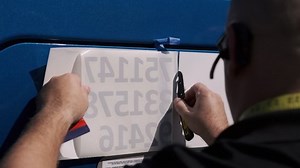 Sticking vinyl logos on vehicles truck