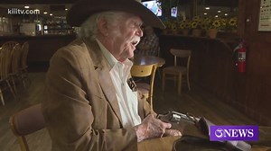 Western movie star Don Collier signing autographs in Mathis, Texas
