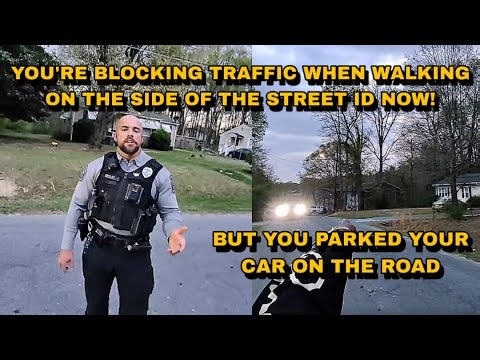 Cop Thinks Walking On The Side Of The Street Is Blocking The Flow Of Traffic