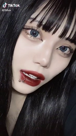 Close-Up Portrait of Individual with Piercing