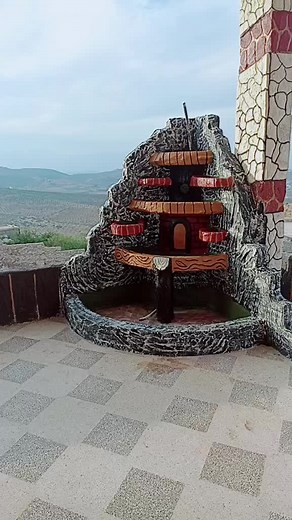 Stunning Decorative Stone Fountain Design in Outdoor Setting