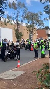 Comancheros taking a selfie at the police check point