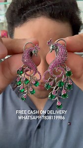 Ruby Emrald Peacock earring is a class apart design , gem stones with ruby and emrald look fabulous . The clip at the back is something everyone loves for safety and comfort wear . WhatsApp 7838119986 FREE CASH ON DELIVERY Showroom : OSR JEWELLERS C -115 LAJPAT NAGAR 1 NEW DELHI 110024 INDIA #osrjewellers #jewellery #earring #monday #openheimer #barbie #peacock #peacockjewellery #ruby #emrald #indianjewellery | OSR JEWELLERS