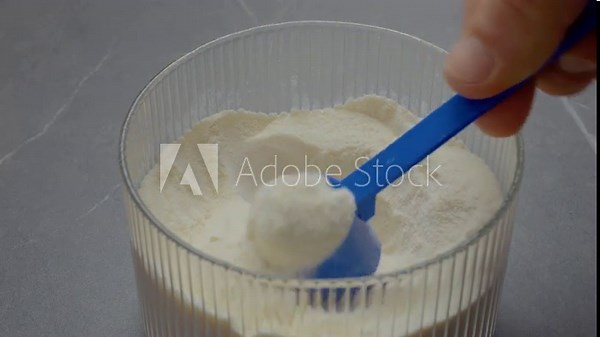 Learn how to store powdered milk in a container using a teaspoon for convenient measuring. This method helps maintain freshness and ensures easy access.