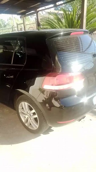 Sleek Black Hatchback Car Interior and Exterior Showcase