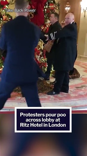 Protesters POUR POO across lobby at Ritz Hotel in London