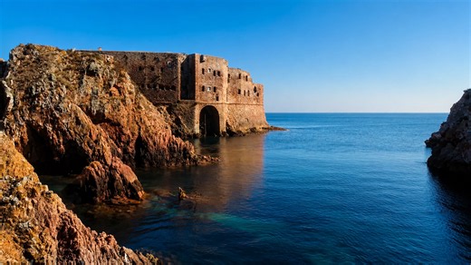 A fortress isolated by ocean and cliffs