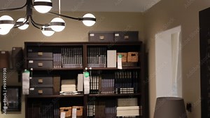 at home small library books and cabinet