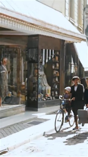 Restored footage from 1926 of a street scene filmed in the historic town centre of Sittard, Netherlands. Footage frame rate increased, upscaled and “colorized” by HistoryColored using AI technology. Footage originally from: Sittard, poort van Neerland´s mijngebied, OpenBeelden, Public Domain Music: Mindstream / Amber Glow / Epidemic Sound #history #sittard #netherlands #historicalfootage | History in Color