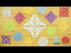 Cómo hacer copos de nieve de papel