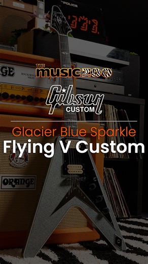 Get ready to MELT FACES 🥶🥶 with this amazing Music Zoo spec’d Gibson Custom Shop Flying V in a wicked cold Glacier Blue Sparkle finish! Watch now as Jordo shows off this disco ball full of riffs and HIT US UP quick before it drifts away; 516-626-9292 or grab it online at www.themusiczoo.com! | The Music Zoo