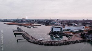 rising drone over Discovery World, lake michigan towards Daniel W. Hoan Memorial Bridge Interstate 794 in Milwaukee Wisconsin, USA
