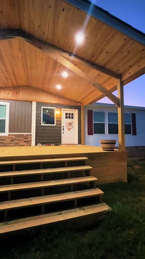 Several have asked for a video of our front porch. Here ya go! 🤍 #manufacturedhomes #frontporch #country #home #postandbeamconstruction