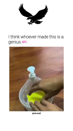 Info Hubs on Instagram: "The video shows a simple yet clever cleaning life hack that impressed many viewers, which is why the text on screen says, “I think whoever made this is a genius.” The scene focuses on a small plastic container placed on a wooden surface. Inside the container is a yellow cleaning sponge, and fixed through the lid is a liquid soap pump dispenser. A person’s hand presses down on the sponge, and at the same time, the sponge pushes upward against the pump mechanism. This acti