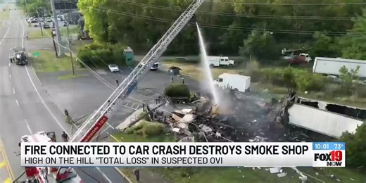 Fire connected to car crash destroys smoke shop