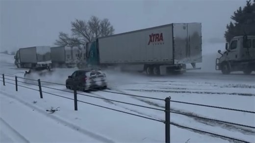 Trucks slide off I-80 amid snowy travel chaos