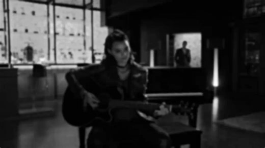 Video and music featuring Tom Ellis and Brianna Hildebrand, also known as Lucifer and Rory, singing "Bridge Over Troubled Water" together. | April Edmonson